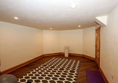 Finished basement with rec room, wine bar, exercise room and full bathroom.