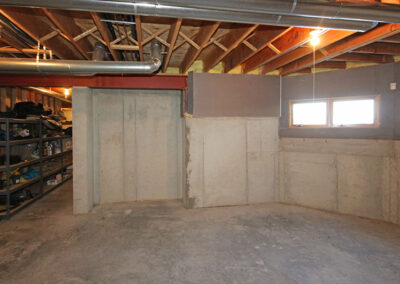 Unfinished basement before remodel