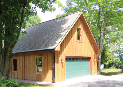 Cute detached garage in Baileys Harbor with cabin look.