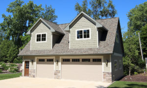 3 stall garage with bonus room with dormers, built by PortSide Builders.