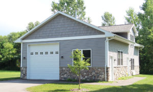 Single stall garage with additional storage and living space above. Built by Portside Builders in Door County, WI