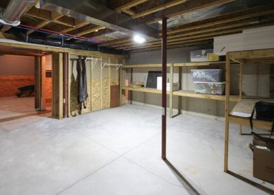 Unfinished basement before