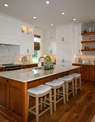Stained Maple Island with Warm White Upper Cabinets, Ceramic Tile in Mixed Neutrals