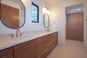 Quartz Countertop with Natural Veining, Shower with Wood-look Ceramic Tile